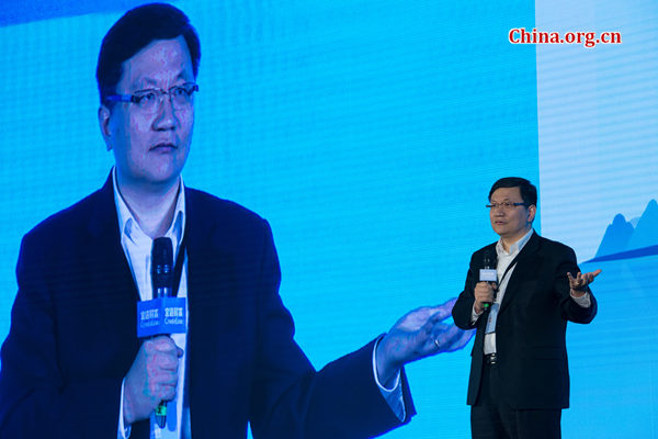Tang Ning, founder and CEO of CreditEase, delivers a keynote speech on June 24, 2017, at the First Capital Market Forum held by the company in Beijing. [Photo by Chen Boyuan / China.org.cn]