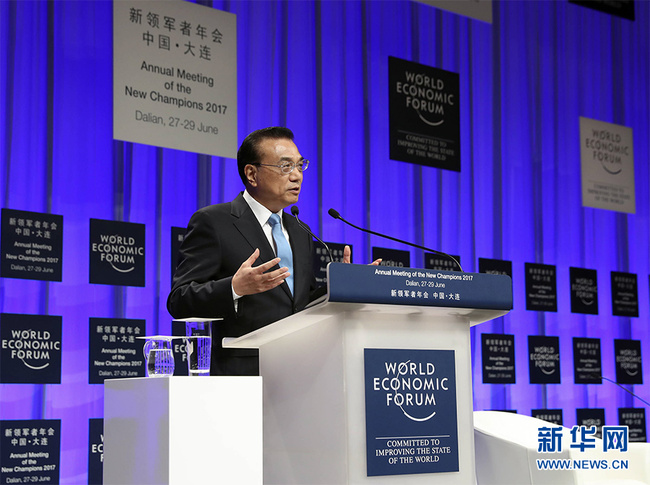 Chinese Premier Li Keqiang addresses the opening ceremony of the 11th Annual Meeting of the New Champions.
