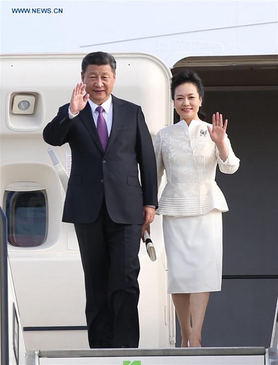Chinese President Xi Jinping and his wife Peng Liyuan wave upon their arrival in Berlin, Germany, July 4, 2017. Xi arrived here on Tuesday for his second state visit to Germany. [Photo/Xinhua]