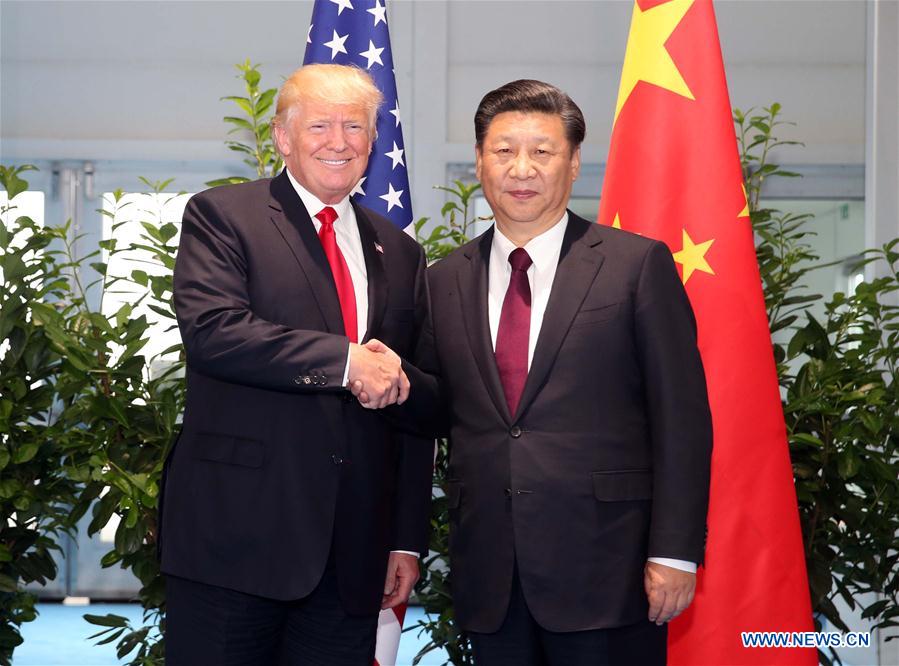 Chinese President Xi Jinping (R) meets with his U.S. counterpart Donald Trump to discuss bilateral ties and global hot-spot issues on the sidelines of a Group of 20 (G20) summit, in Hamburg, Germany, July 8, 2017. [Photo/Xinhua]