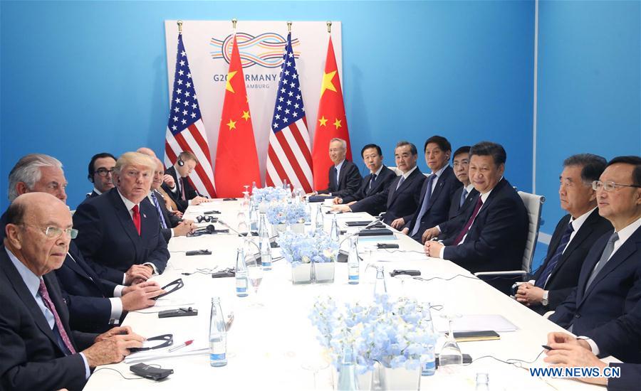 Chinese President Xi Jinping meets with his U.S. counterpart Donald Trump to discuss bilateral ties and global hot-spot issues on the sidelines of a Group of 20 (G20) summit, in Hamburg, Germany, July 8, 2017. [Photo/Xinhua]