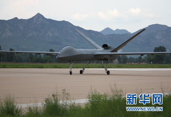 China's unmanned aerial vehicle CH-5, or 'Rainbow 5', completes its trial flight in north China's Hebei Province Friday. [Photo/Xinhua] 