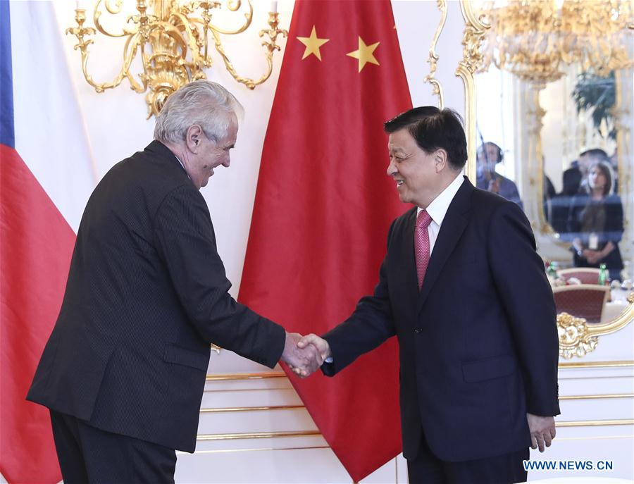 Liu Yunshan (R), a member of the Standing Committee of the Political Bureau of the Communist Party of China (CPC) Central Committee, meets with Czech President Milos Zeman in Prague, the Czech Republic, July 18, 2017. [Photo/Xinhua]