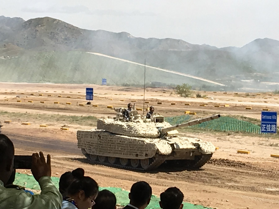 A domestically developed tank used by Chinese land forces is presented to hundreds of foreign military officers at a shooting range in the Inner Mongolia autonomous region on Aug 16, 2017. [Photo by Zhao Lei/chinadaily.com.cn]