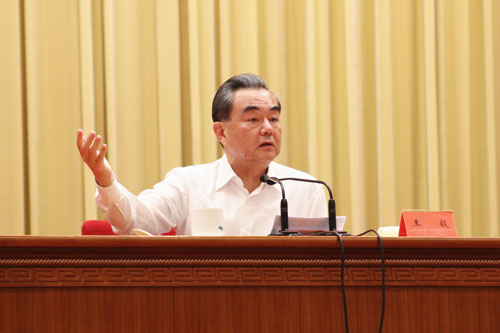 Chinese Foreign Minister Wang Yi gives a report on China's five-year achievements in diplomacy in Beijing, Aug. 29, 2017. [Photo/fmprc.gov.cn]