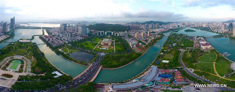 Aerial panoramic photo combined on Aug. 24, 2017 shows a part of Xiamen, a coastal city in southeast China&apos;s Fujian Province. The BRICS summit and the Dialogue of Emerging Markets and Developing Countries are to be held here from Sept. 3 to 5. (Xinhua/Jiang Kehong)