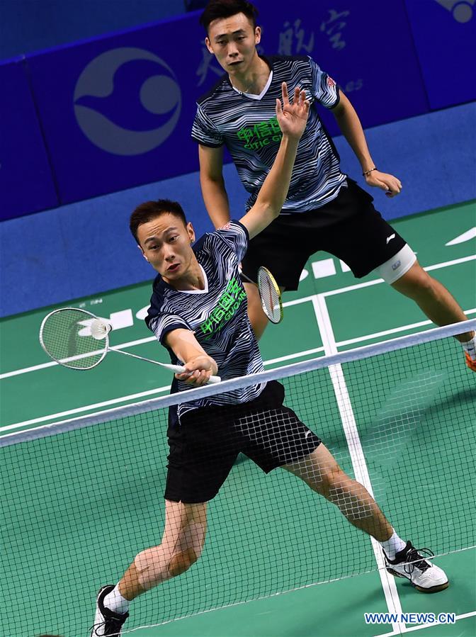 Zhang Nan (front) and Yu Xiaoyu of Beijing compete during the men&apos;s team of badminton Group E match against Jiangsu at the 13th Chinese National Games in north China&apos;s Tianjin Municipality, Sept. 1, 2017. Beijing won the match by 3-0. (Xinhua/Xu Chang)