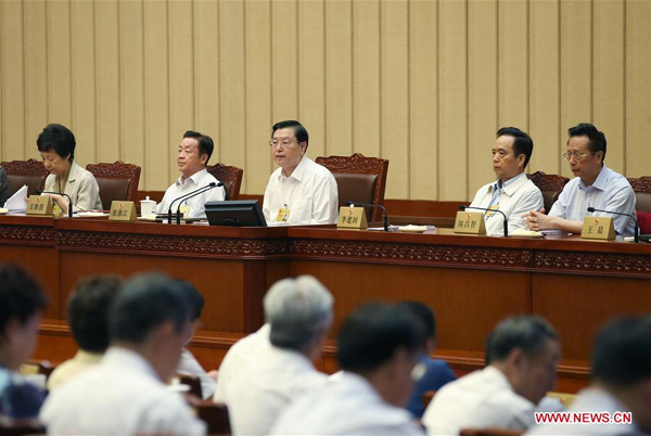 Zhang Dejiang (back C), chairman of the Standing Committee of China's National People's Congress (NPC), presides over the closing meeting of the 29th session of the 12th NPC Standing Committee in Beijing, capital of China, Sept. 1, 2017. (Xinhua/Yao Dawei) 