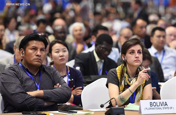 Representatives attend the 13th Session of the Conference of the Parties (COP 13) to the United Nations Convention to Combat Desertification (UNCCD) in Ordos, north China's Inner Mongolia Autonomous Region, Sept. 6, 2017. The 13th Session of the Conference of the Parties (COP 13) to the United Nations Convention to Combat Desertification (UNCCD) opened Wednesday in Ordos. [Photo/Xinhua]
