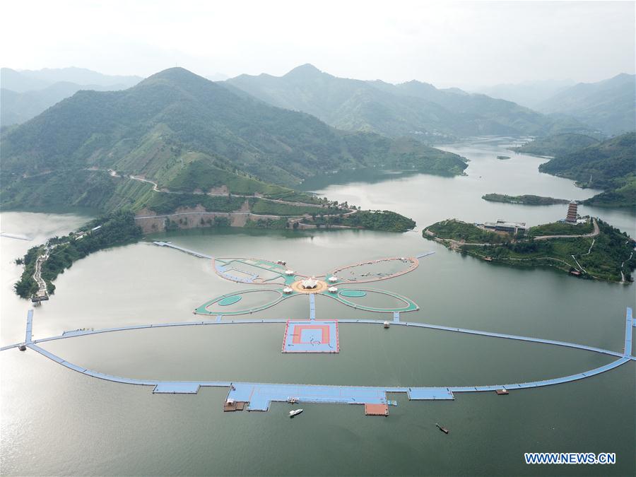 Aerial photo taken on Sept. 11, 2017 shows a butterfly-shaped floating boardwalk in Hongshuihe Town of Luodian County, southwest China&apos;s Guizhou Province. 