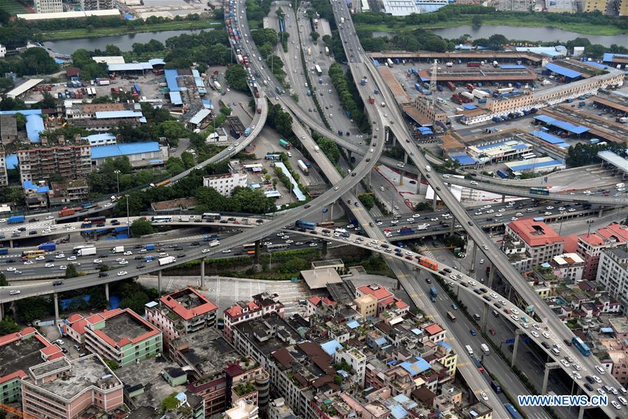 Aerial photo taken on Oct. 6, 2017 shows a one-way traffic jam in a section of the Guangzhou-Heyuan Highway, south China's Guangdong Province. As the 8-day National Day holiday draws to its end, vacationers begin to jam highways again to make a return trip. [Photo/Xinhua]