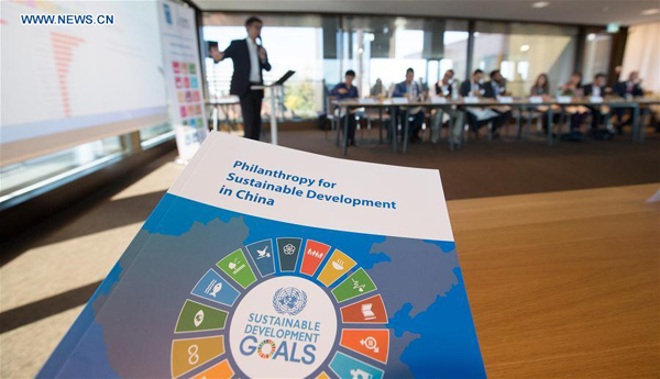 Photo taken on Oct. 13, 2017 shows the launching ceremony of the 'Philanthropy for SDGs in China' report in Geneva, Switzerland. Philanthropy in China has grown into a sector that has been really contributing a lot to achieving UN Sustainable Development Goals (SDGs), thanks to the fast development of both Chinese economy and society, UN Development Program (UNDP) China Director Agi Veres said on Friday. (Xinhua/Xu Jinquan)