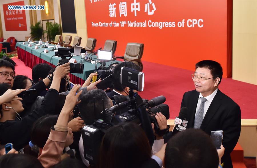 China's Minister of Housing and Urban-Rural Development Wang Menghui receives an interview after a press conference held by the press center of the 19th National Congress of the Communist Party of China (CPC) in Beijing, capital of China, Oct. 22, 2017. The press conference was themed on securing and improving people's livelihood. [Photo/Xinhua]