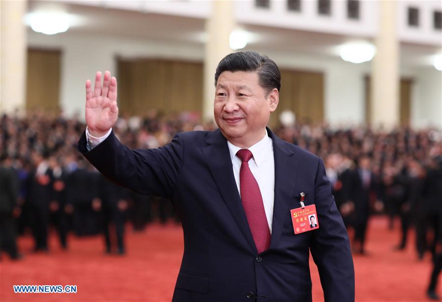 Xi Jinping, general secretary of the Communist Party of China (CPC) Central Committee, who is also Chinese president and chairman of the Central Military Commission, meets with delegates, specially invited delegates and non-voting participants of the 19th CPC National Congress at the Great Hall of the People in Beijing, capital of China, Oct. 25, 2017. (Xinhua/Lan Hongguang)