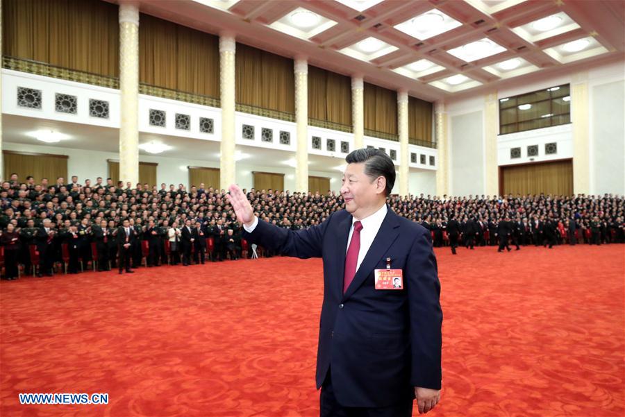 Xi Jinping, general secretary of the Communist Party of China (CPC) Central Committee, who is also Chinese president and chairman of the Central Military Commission, meets with delegates, specially invited delegates and non-voting participants of the 19th CPC National Congress at the Great Hall of the People in Beijing, capital of China, Oct. 25, 2017. (Xinhua/Ju Peng)