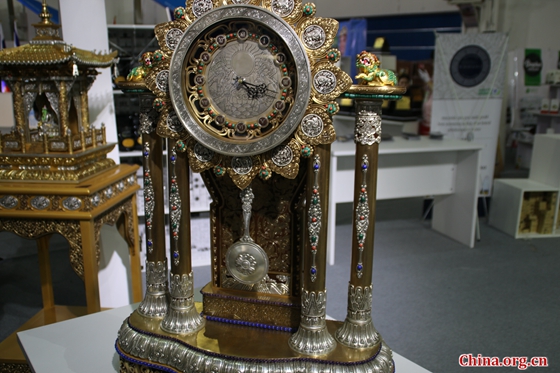 A clock designed by Ochir is exhibited at 2nd China-Mongolia Expo in Hohhot, capital of north China's Inner Mongolia Autonomous Region, on Sept. 26, 2017. [Photo by Zhao Shan/China.org.cn]