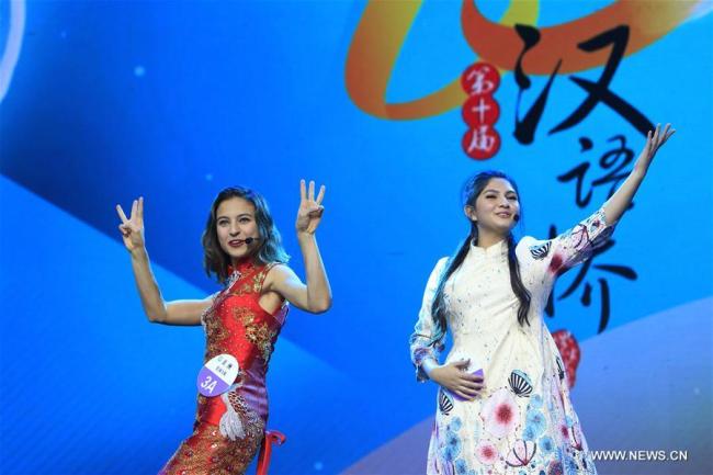 Contestants take part in the final of the 10th Chinese Bridge the Chinese Proficiency Competition for Foreign Secondary School Students in Kunming, southwest China's Yunnan Province, Oct. 28, 2017. [Photo: Xinhua] 