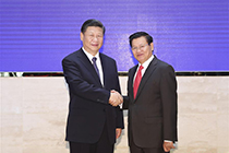 President Xi meets Lao PM on ties