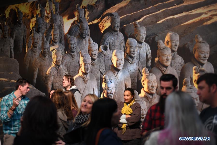 People wait to view terracotta warriors during a press preview at the Virginia Museum of Fine Arts (VMFA) in Richmond, Virginia, the United States, on Nov. 15, 2017. Titled &apos;Terracotta Army: Legacy of the First Emperor of China,&apos; the exhibition features more than 130 artifacts, including 10 life-size terracotta warriors. The exhibition will be at VMFA from Nov. 18 to March 11, 2018. (Xinhua/Yin Bogu) 