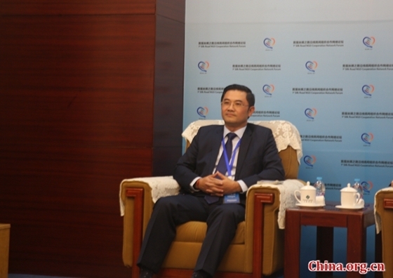 Kemreat Viseth, chairman of Cambodian Civil Society Alliance Forum, speaks at the First Silk Road NGO Cooperation Network Forum in Beijing on Nov. 22, 2017. [Photo by Gong Jie/China.org.cn]