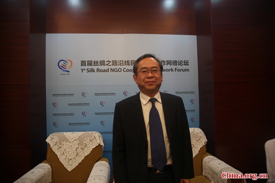 Li Yonghui, dean of School of International Relations and Diplomacy in Beijing Foreign Studies University, speaks at the First Silk Road NGO Cooperation Network Forum in Beijing on Nov. 22, 2017. [Photo by Gong Jie/China.org.cn]