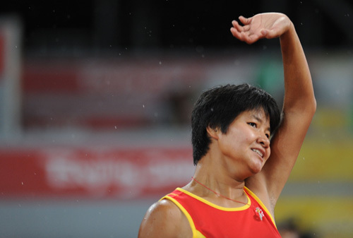 Wang Fang of China wins the gold medal in the Women's 100m T36. 