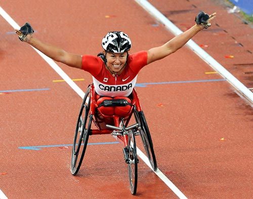 Chantal Petitclerc of Canada wins the gold medal in the Women's 1500m T54.