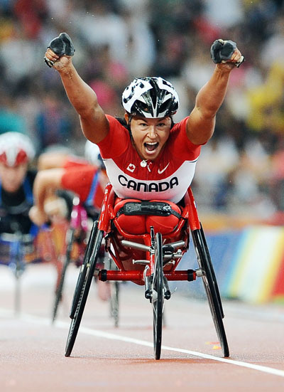 Chantal Petitclerc of Canada wins the gold medal in the Women's 1500m T54. 