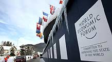 Flags and logo of the World Economic Forum (WEF) are seen at the conference center in Davos, Switzerland, on January 26, 2009. [Xinhua]