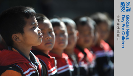 Photo taken on October 24, 2009 shows a group of pupils standing attention on the class of physical exercises at the Orphanage School for Ethnic Minorities in Lijiang, southwest China's Yunnan Province.