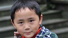 The undated photo shows Tang Zhikai, in Chongqing, southwest China. I am Tang Zhikai, eight years old, and a third-grade pupil in Bashu Primary School of Chongqing Municipality.