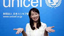 The UN Children's Fund (UNICEF) Goodwill Ambassador and singer Agnes Chan from Hong Kong gestures at an activity to mark the Universal Children's Day and the 20th anniversary of the adoption of the UN Convention on the Rights of the Child (CRC) in Tokyo, capital of Japan, November 20, 2009, the day of Universal Children's Day.