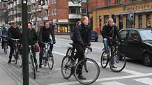 People ride bicycles on a bicycle path in Copenhagen, capital of Denmark, on November 23, 2009.