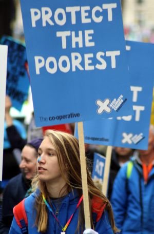 People take part in a demonstration in London, capital of Britain, on December 5, 2009.