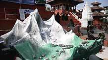 A replica of the Himalayan region is displayed at an exhibition on the Basantapur Durbar Square in Kathmandu, capital of Nepal, December 6, 2009.