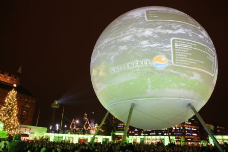 A giant model of the earth is illuminated by electricity generated by people&apos;s riding bicycles in front of the city hall of Copenhagen, Denmark, December 7, 2009, on the occasion of the United Nations Climate Change Conference (COP15).