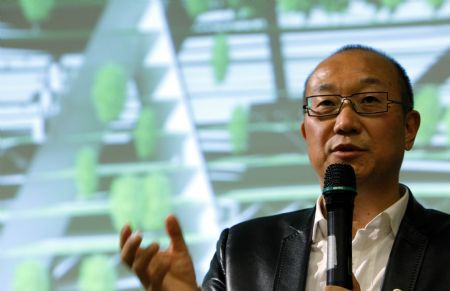Board chairman of Wantong Corporation Feng Lun speaks during a forum on climate change held by the Chinese business delegation in Copenhagen, Denmark, December 8, 2009. 