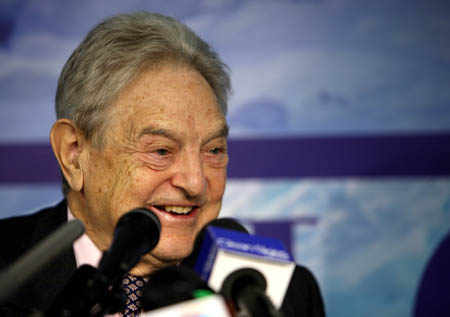 Financier George Soros speaks at a news conference on the sidelines of the United Nations Climate Change Conference in Copenhagen, capital of Denmark, December 10, 2009. Soros on Thursday proposed that the richest nations use US$100 billion of the foreign exchange reserves they received from the International Monetary Fund to develop emission-reducing projects in poor countries.