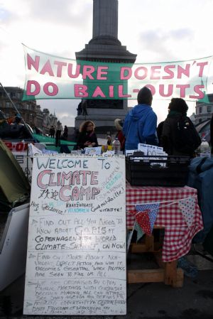 Visitors visit the Climate Camp set up by environmentalists at the Trafalgar Square in downtown London, Britain, December 12, 2009. 