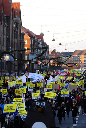 Environmentalists march to Bella Center, the venue of the United Nations Climate Change Conference, in Copenhagen, Denmark, December 12, 2009. 