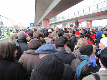 Delegates to the United Nations climate change conference are waiting outside the convention center in Copenhagen, December 14, 2009.