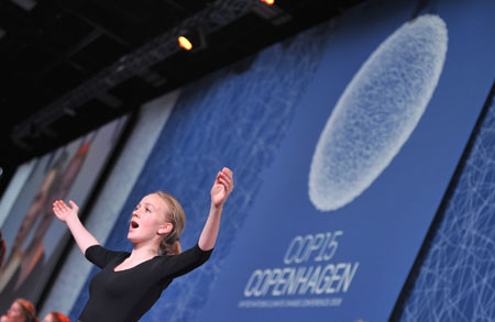 Danish girls dance during the opening ceremony of the high-level segment of UN Climate Change Conference in Copenhagen, capital of Denmark, December 15, 2009.