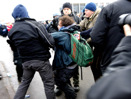 Poliemen disperse protesters outside Bella center in Copenhagen, Denmark, December 16, 2009. 