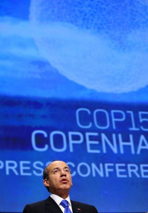 Mexican President Felipe Calderon address the media after being presented with the the Globe International Award by British Prime Minister Gordon Brown during the United Nations Framework Climate Change Conference in Copenhagen, Denmark, December 17, 2009. 