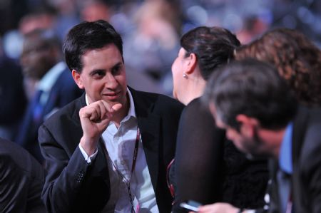 British Secretary of State for Energy and Climate Change Edward Miliband (L) talks with other representatives during the UN Climate Change Conference in Copenhagen, capital of Denmark, on December 19, 2009. 