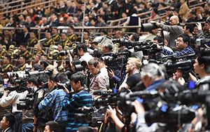 Journalists work at the closing meeting of the fifth session of the 12th National People's Congress at the Great Hall of the People in Beijing, capital of China, March 15, 2017.