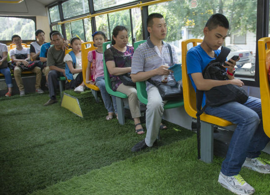 Bus line 931 in Urumqi, Xinjiang Uygur Autonomous Region, shows up on July 16, 2014 with green grass paved on the floor. 