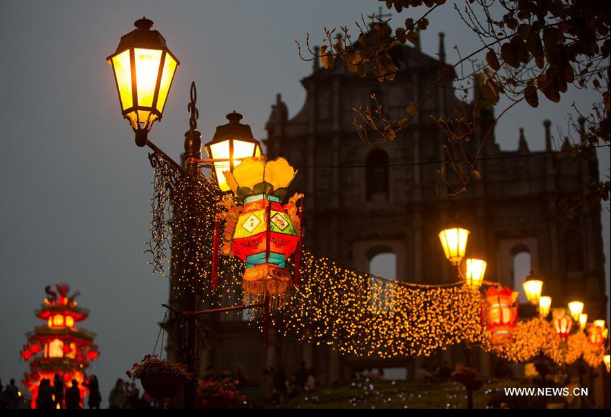 Lanterns are hung up to greet the upcoming Spring Festival in Macao, south China, on Jan. 29, 2016. The Spring Festival, or the Chinese Lunar New Year, will fall on February 8 this year. According to Chinese zodiac, 2016 is the Year of the Monkey. (Xinhua/Cheong Kam Ka)