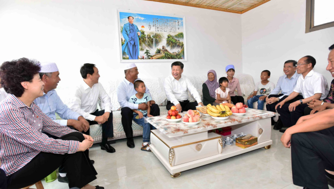 President Xi Jinping visits villager of Hui ethnic group Hai Guobao's home in the Yuanlong Migrant Village of Minning Town in Yinchuan, capital of northwest China's Ningxia Hui Autonomous Region, July 19.