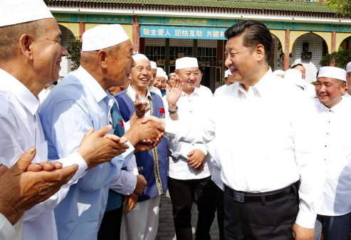 President Xi Jinping talks with local Muslims at Xincheng Mosque in Yinchuan, northwest China's Ningxia Hui Autonomous Region, July 19.